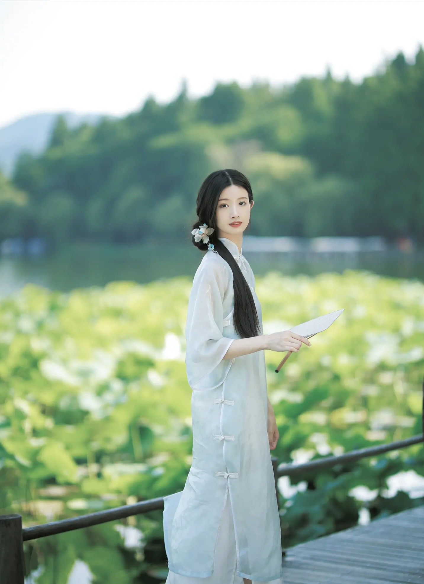 Vintage Cheongsam Style with Traditional Fans and Foldable Fans