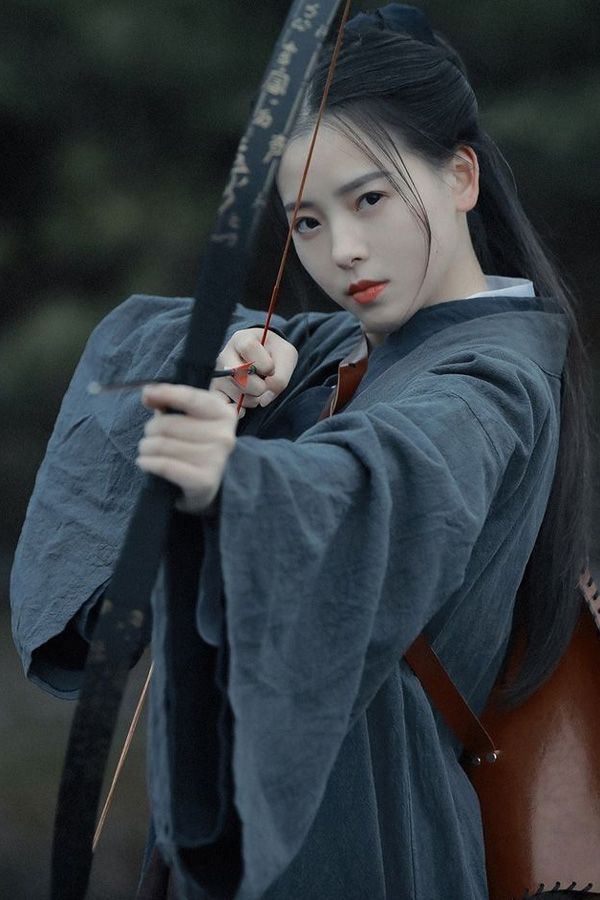 The Enchantment of a Pink Hanfu Robe with Grand Sleeves