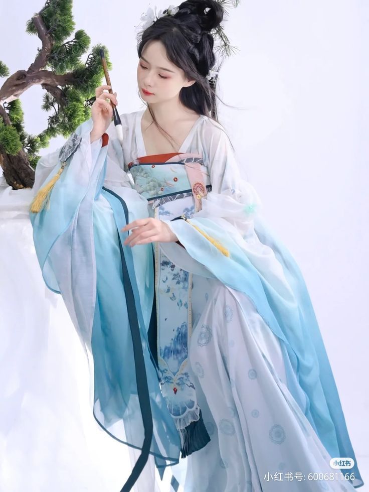 Seductive Cheongsam Tops:A Glance into the Ethereal Beauty of Traditional Chinese Clothing Seductive Cheongsam Tops:A Glance into the Ethereal Beauty of Traditional Chinese Clothing