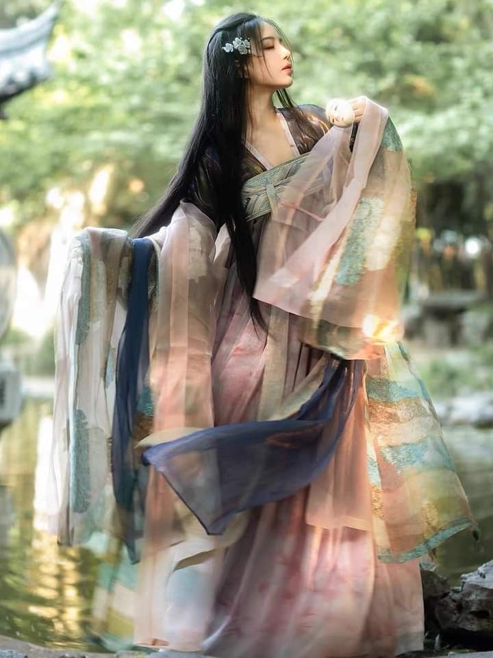 Orange Cat and Traditional Chinese Clothing:A Blend of Cultural Elegance and Feline Charm Orange Cat and Traditional Chinese Clothing:A Blend of Cultural Elegance and Feline Charm
