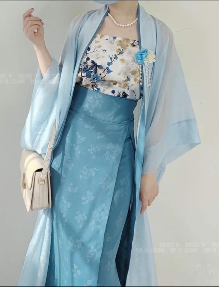 Elegance Reimagined:The Revival of Jiaqi Ruyue Cheongsam