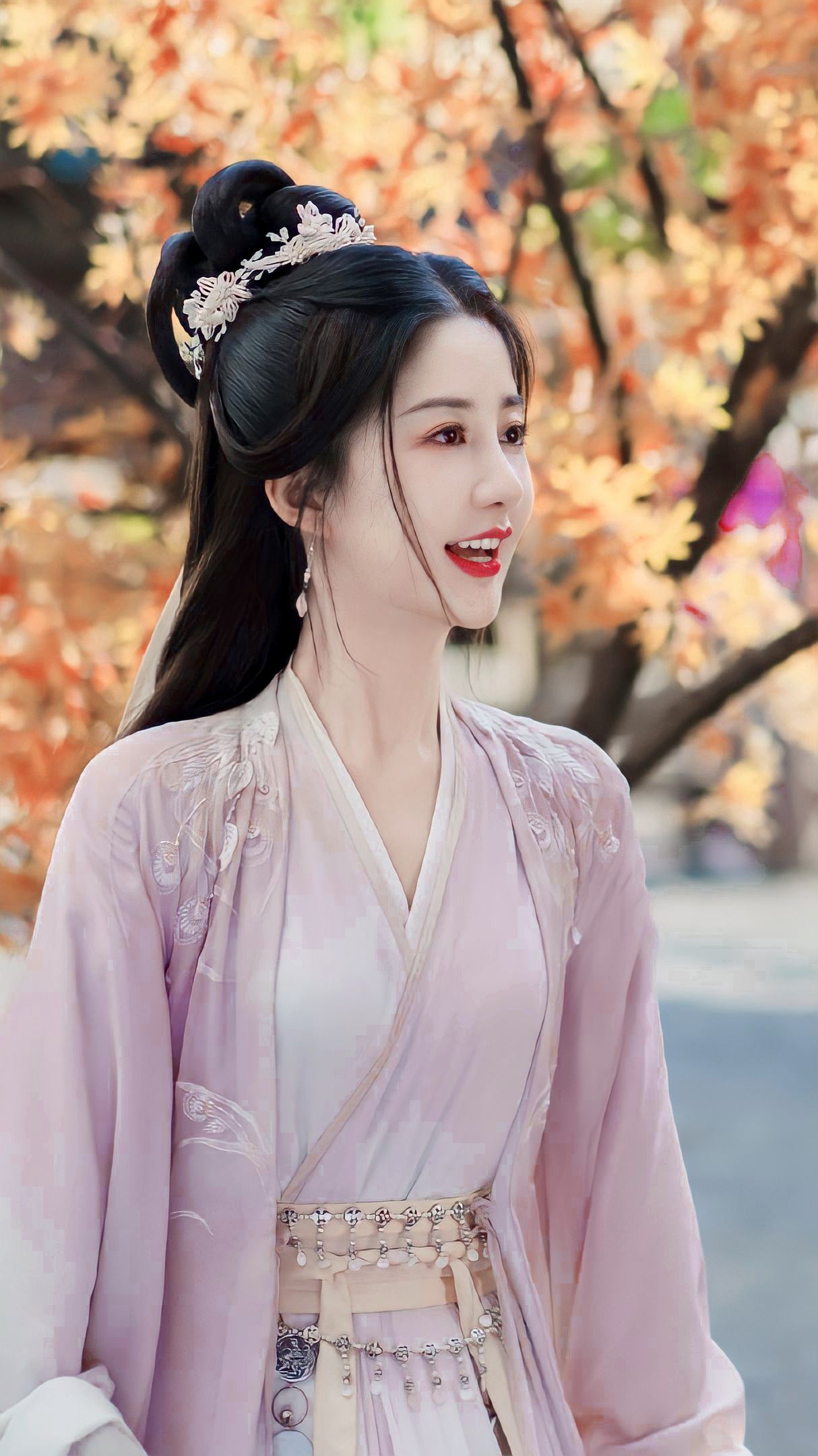Children Embracing Traditional Hanfu Fashion and its Handheld Fans as Accessories