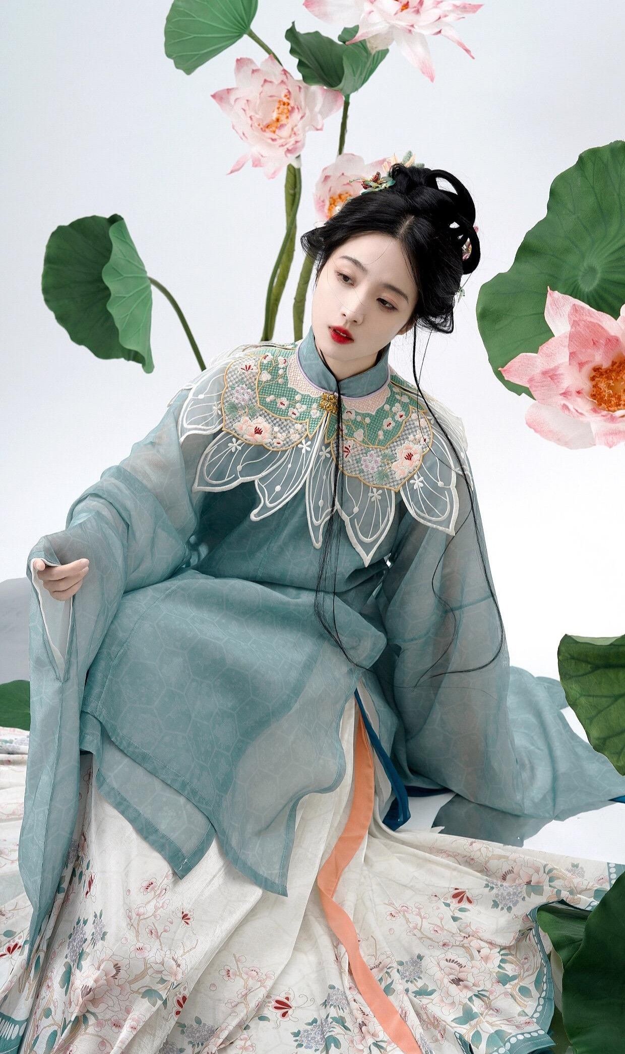The Charm of Qipao with Short Jacket Overlap